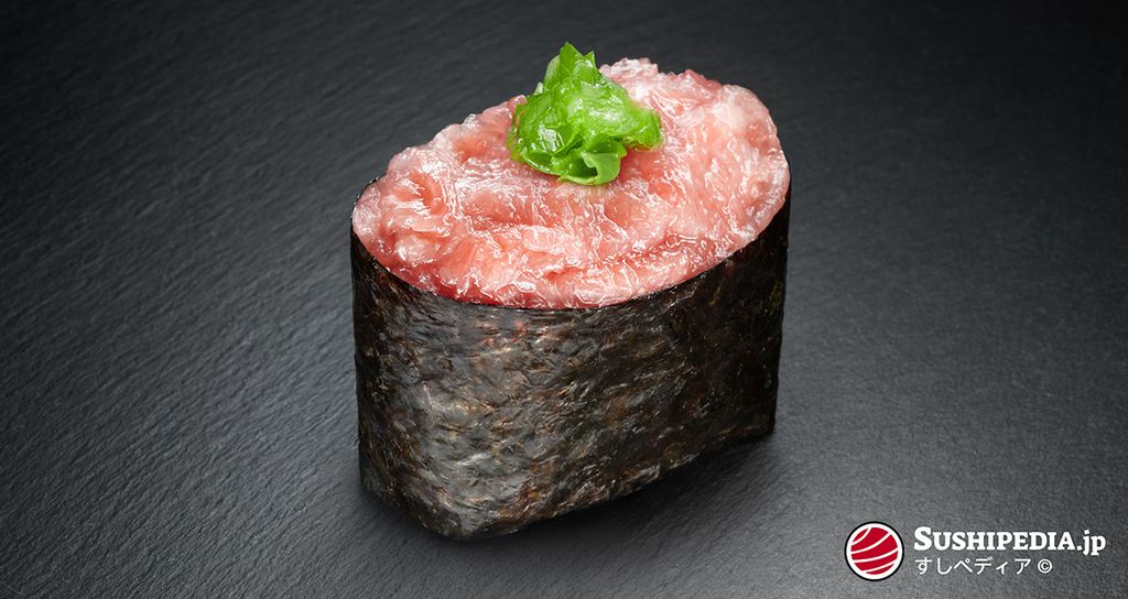 Maguro Negi Toro Gunkan Maki with finely chopped tuna and green onions on a nori sheet