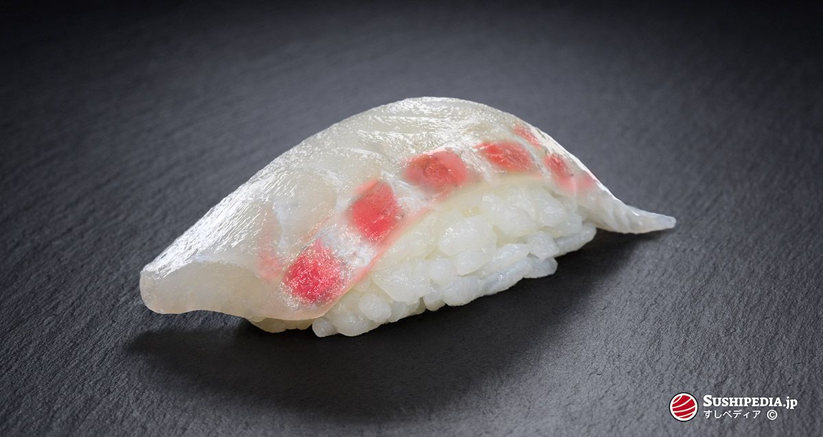 Foto eines frisch zu bereiteten Sushi (nigiri sushi) mit der Zutat, die den japanischen Namen Tai trägt.